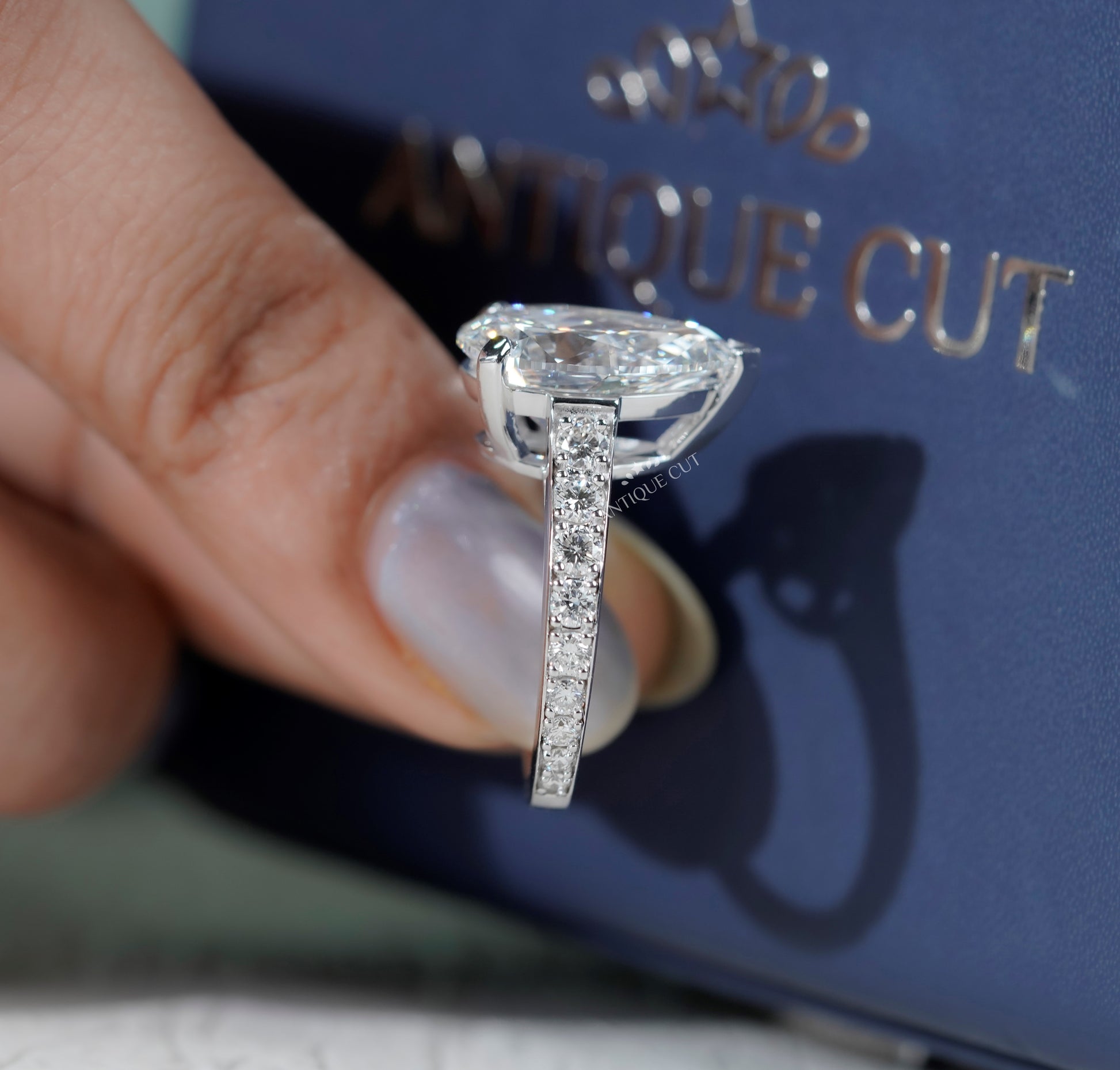 Pear Shaped Engagement Ring with Pave Band