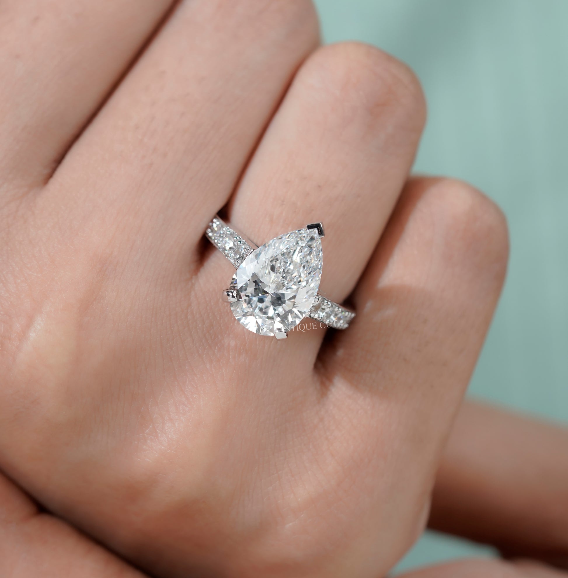 Pear Shaped Engagement Ring with Pave Band