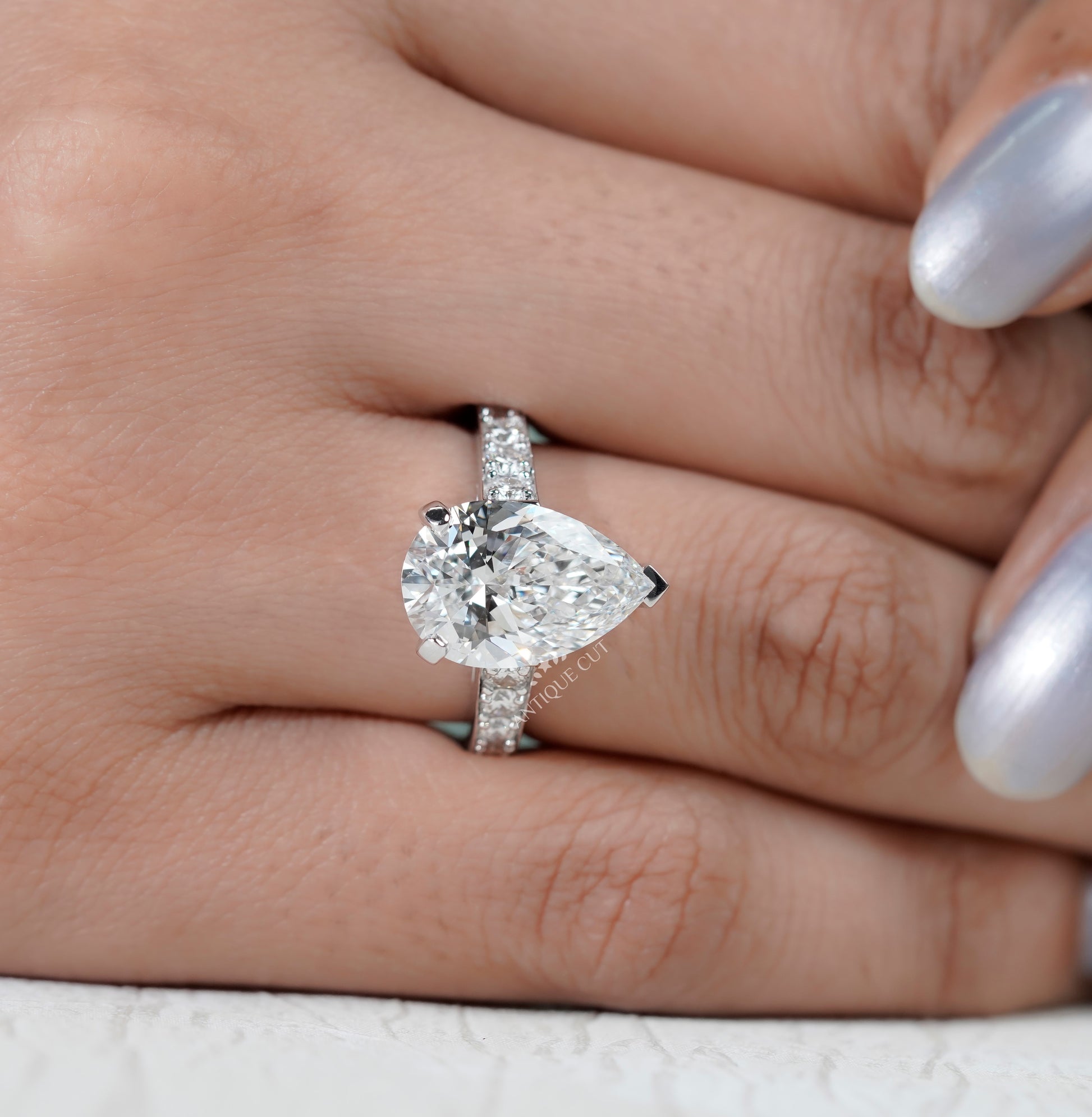 Pear Shaped Engagement Ring with Pave Band