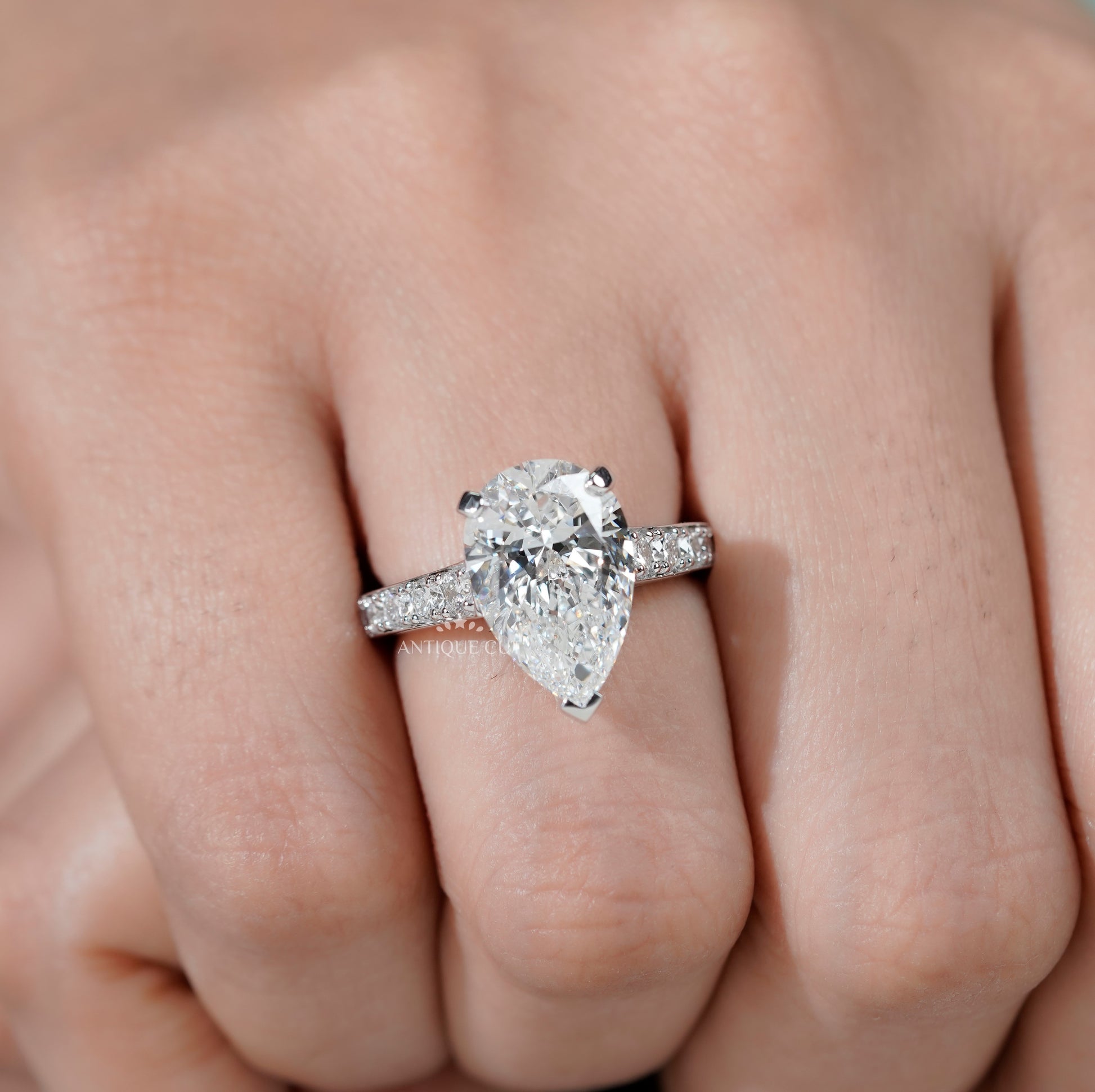 Pear Shaped Engagement Ring with Pave Band
