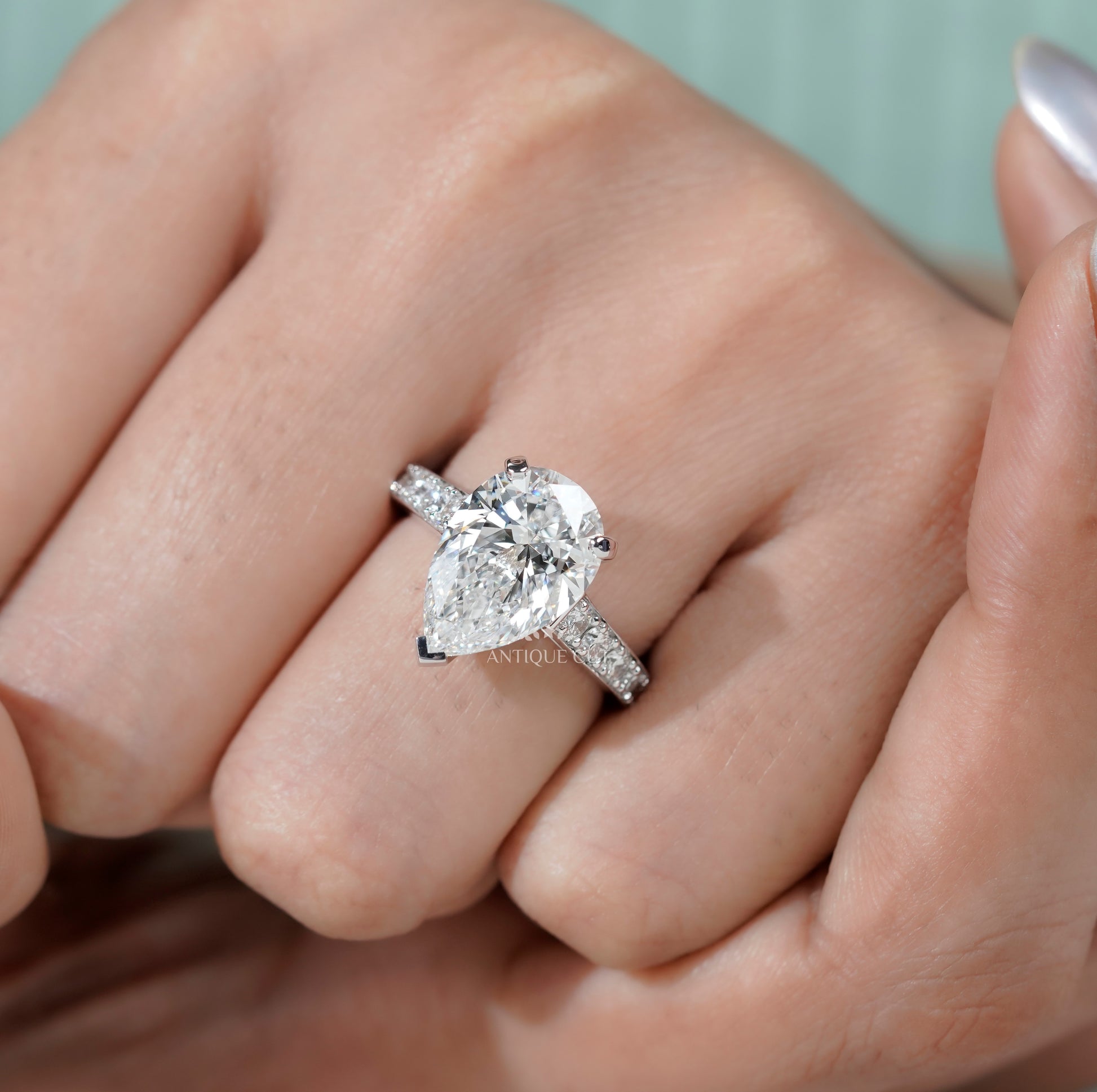 Pear Shaped Engagement Ring with Pave Band