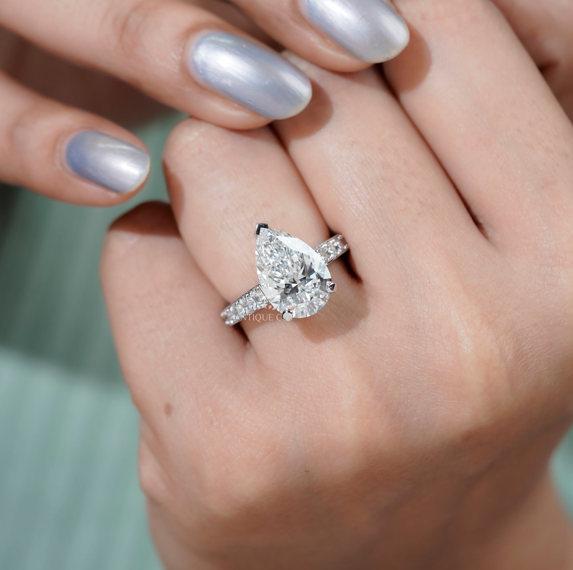 Pear Shaped Engagement Ring with Pave Band