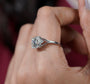 White gold round diamond engagement ring with split side design
