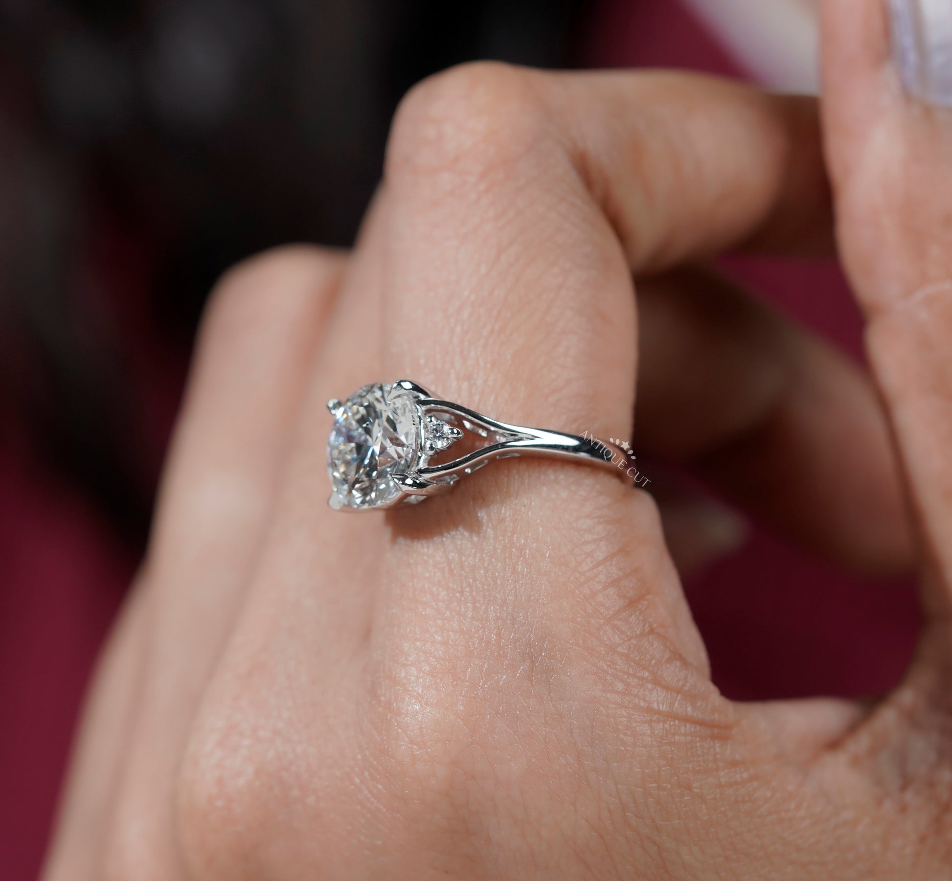 White gold round diamond engagement ring with split side design