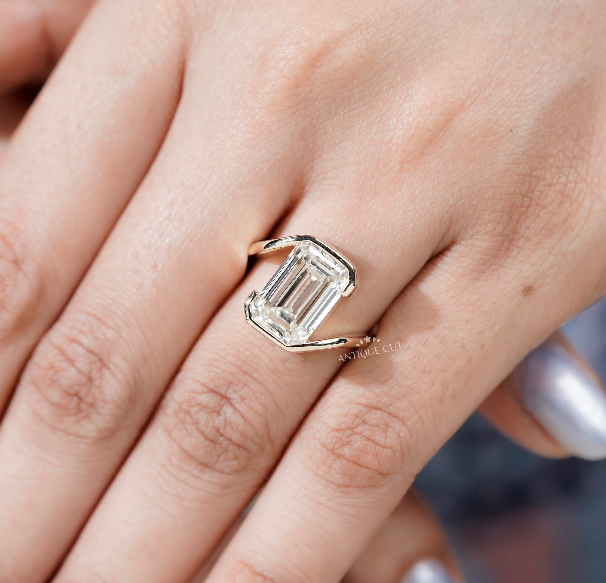 Emerald Cut Engagement Ring with Half Bezel Set