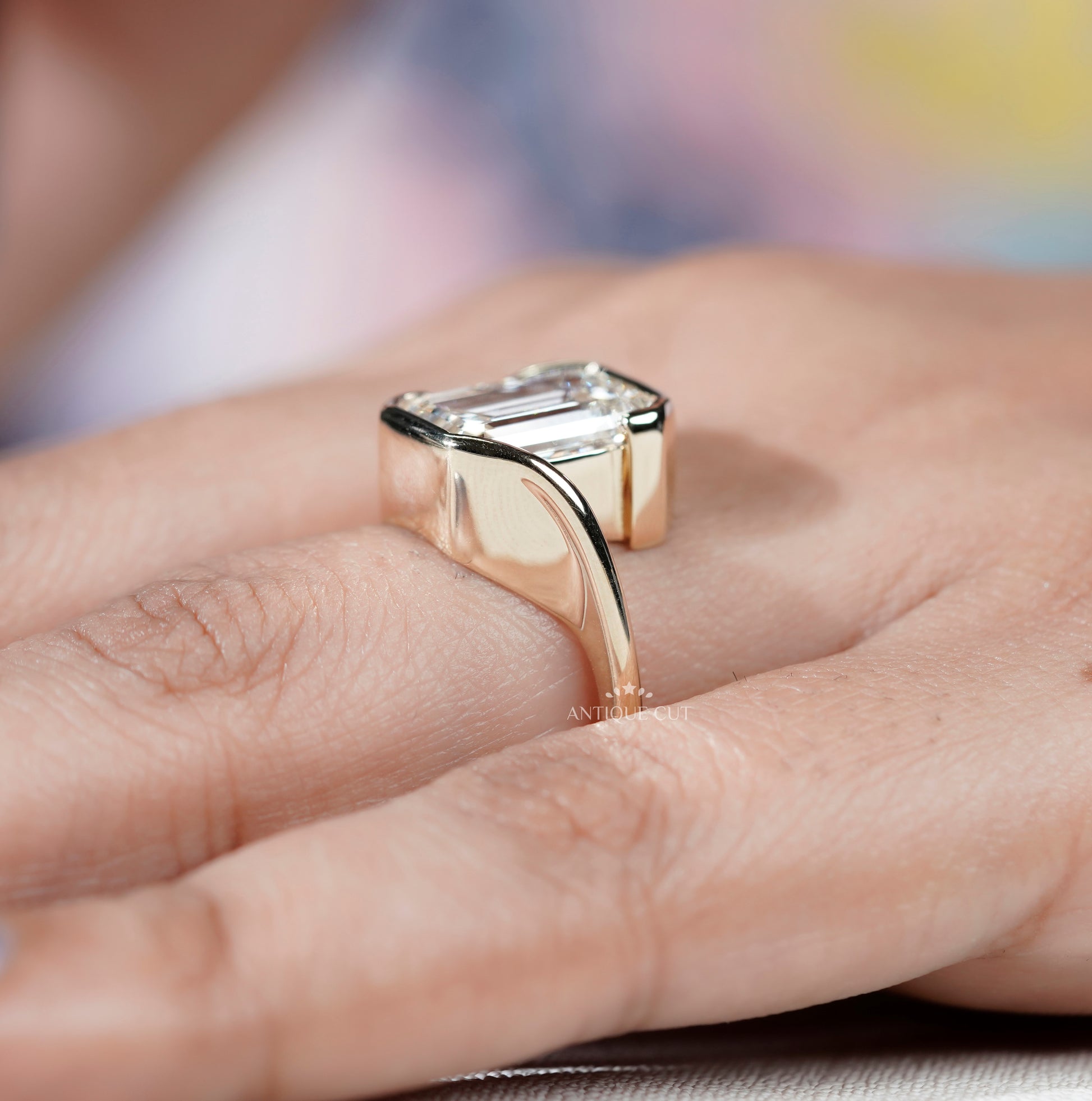 Emerald Cut Engagement Ring with Half Bezel Set