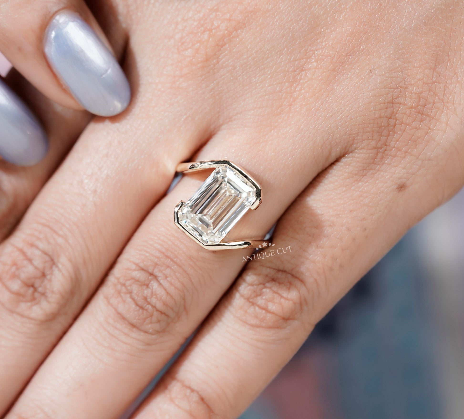 Emerald Cut Engagement Ring with Half Bezel Set