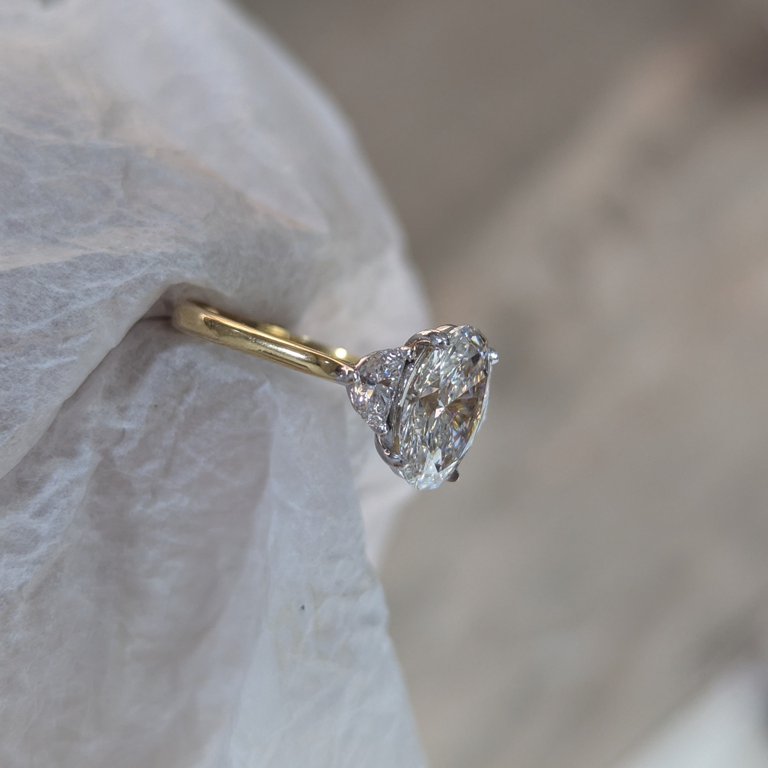 Oval 3.00tcw Lab Grown Diamond Cathedral Two Tone Three Stone Engagement Ring, DEF Color, VVS-VS Clarity
