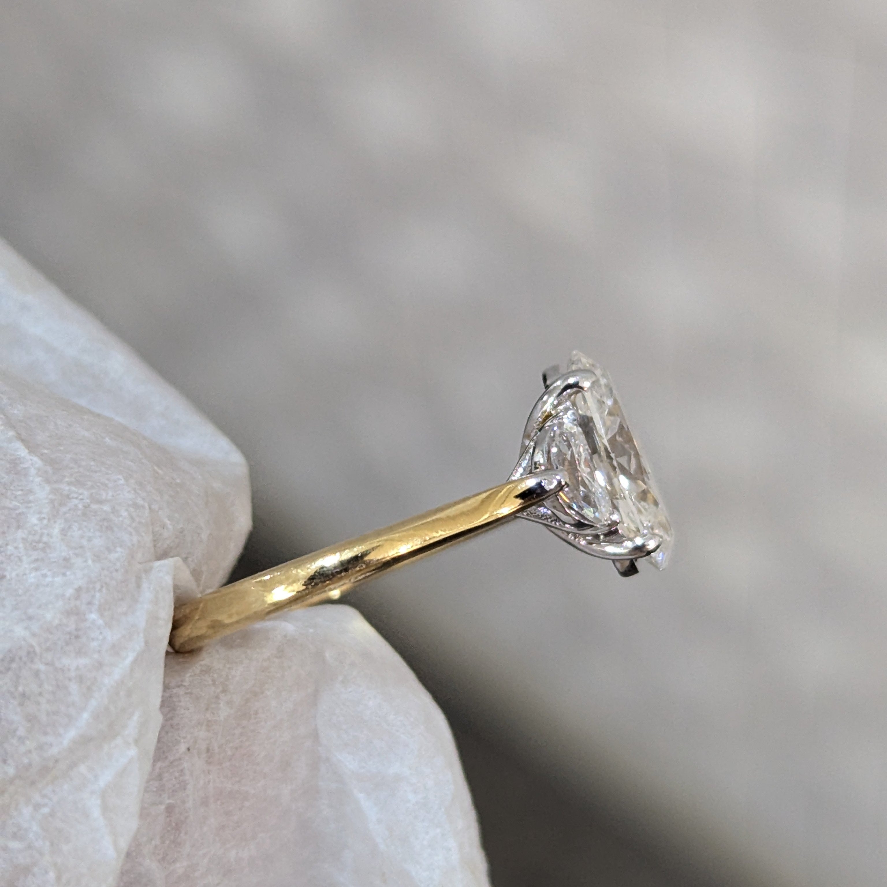 Oval 3.00tcw Lab Grown Diamond Cathedral Two Tone Three Stone Engagement Ring, D-E-F Color, VVS-VS Clarity