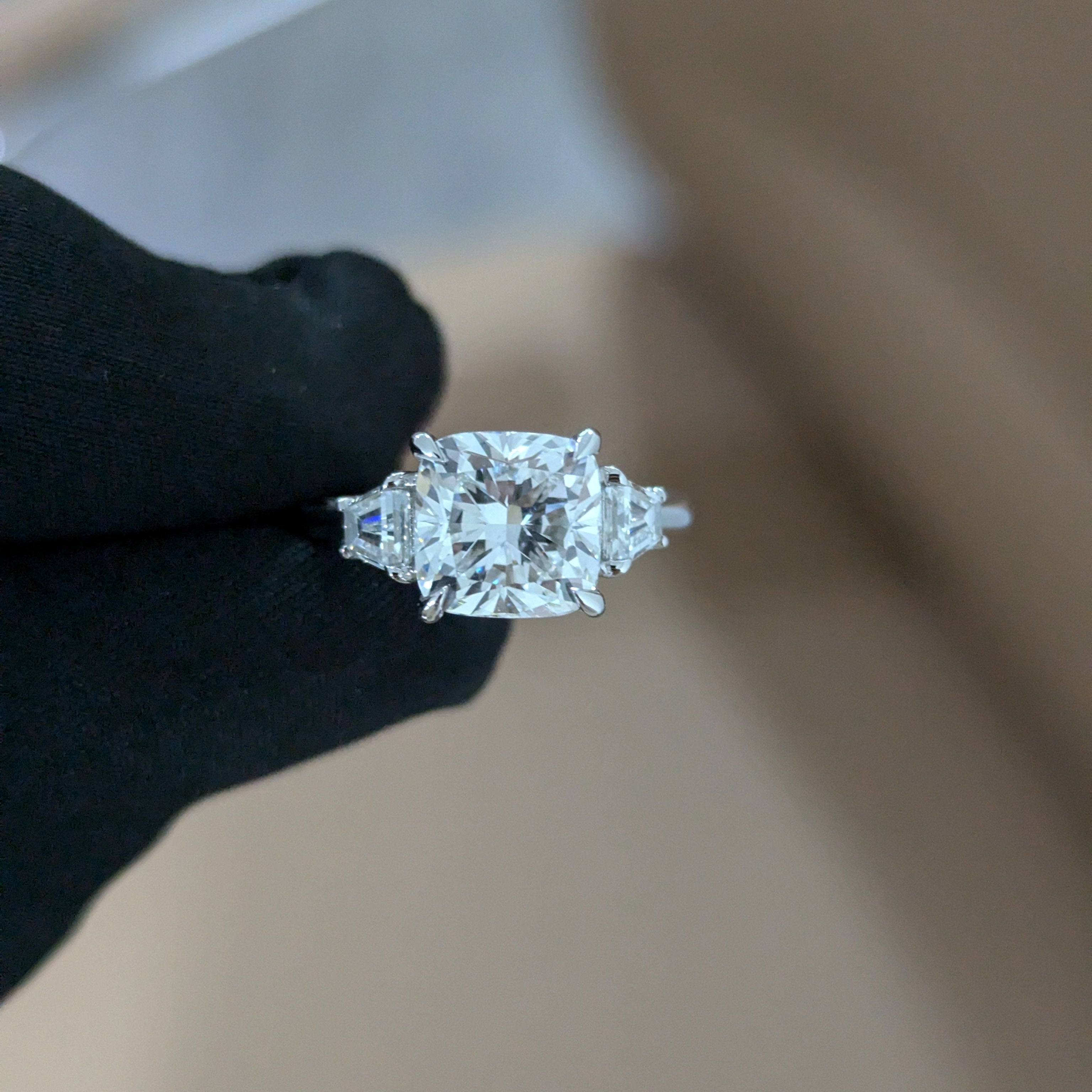 Three Stone 3.50tcw Cushion Lab Grown Diamond Ring | Trapezoid Accents | IGI Certified