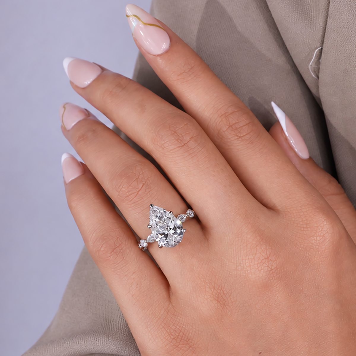 Luxury yellow gold pear lab grown diamond ring with custom engagement design