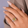 Three stone cushion cut diamond engagement ring