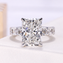 Radiant cut lab grown engagement ring with side stones and IGI certified diamond center