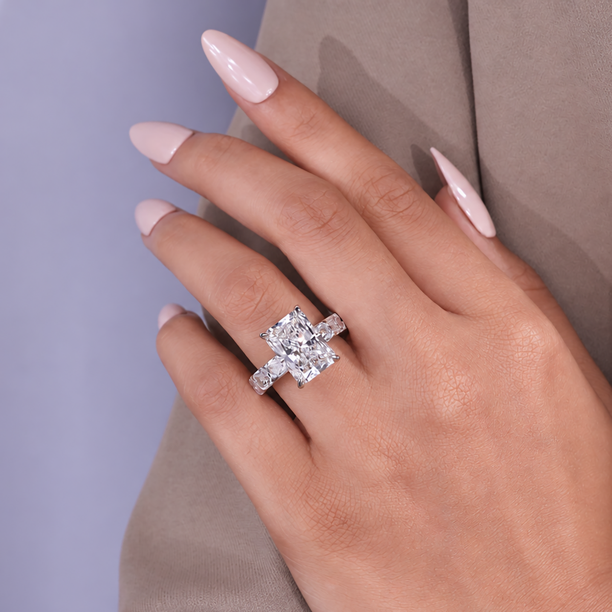 Radiant cut lab grown diamond ring designed with sparkling side stone details