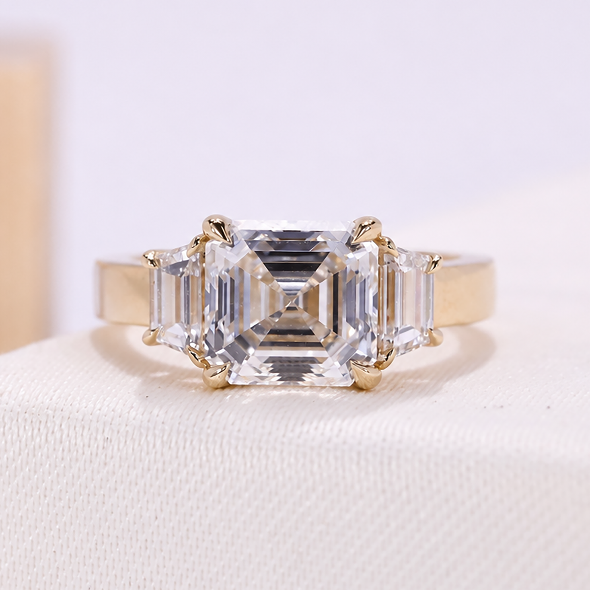 3.00 carat lab grown Asscher cut three stone engagement ring