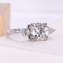 cushion cut with pear cut side stone 