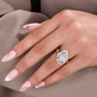 Pear diamond bridal ring featuring bezel setting and IGI certified diamond