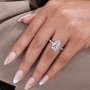 Pear cut lab grown diamond engagement ring with secure bezel setting
