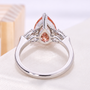 Pear cut pink lab grown diamond ring with IGI certified center diamond