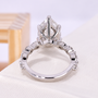 Minimal bezel setting engagement ring with pear lab grown diamond center