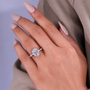 Cushion lab grown diamond engagement ring with hidden halo and side stones