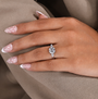 Cushion cut ring with pear cut side stone