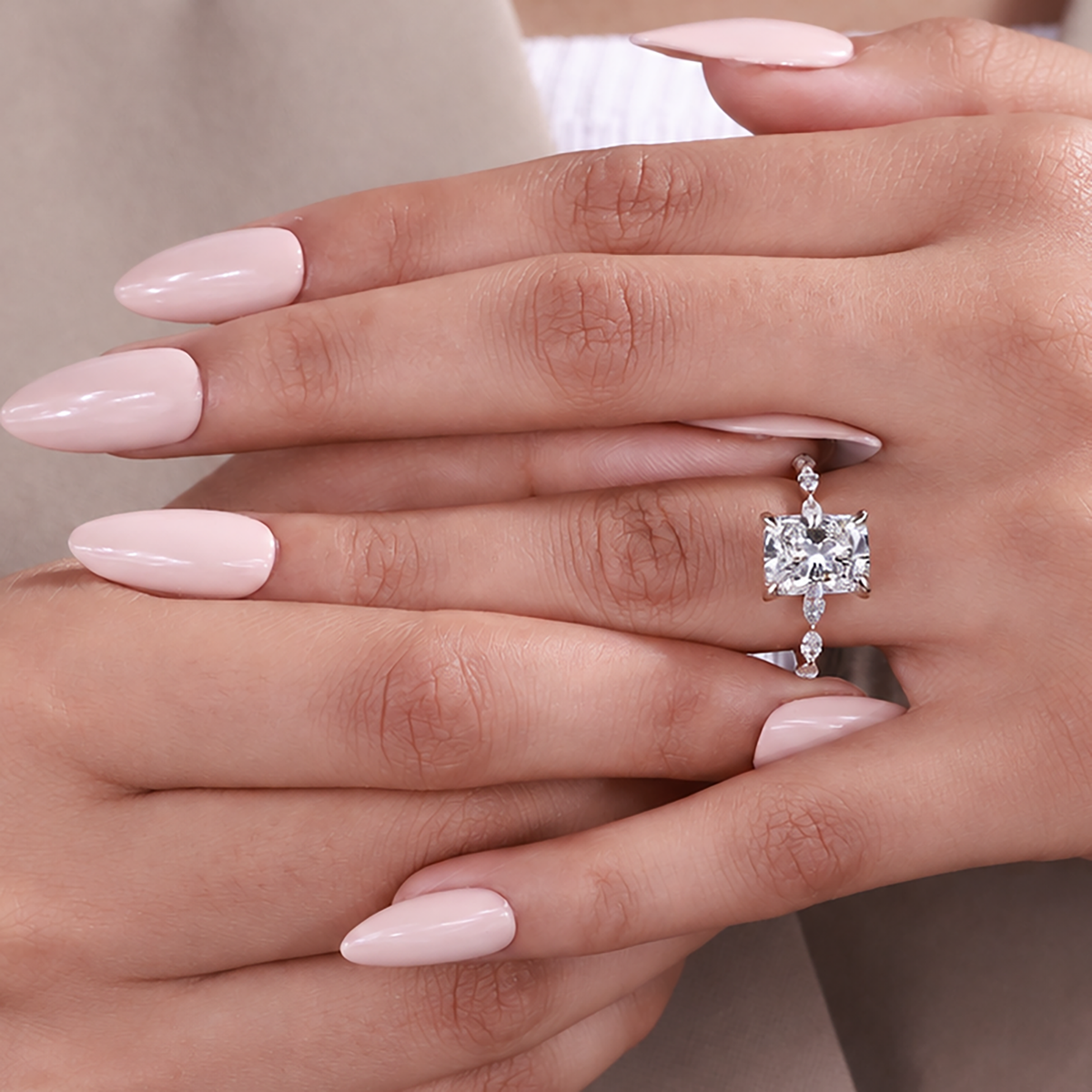 Lab grown cushion diamond ring with hidden halo and side stones