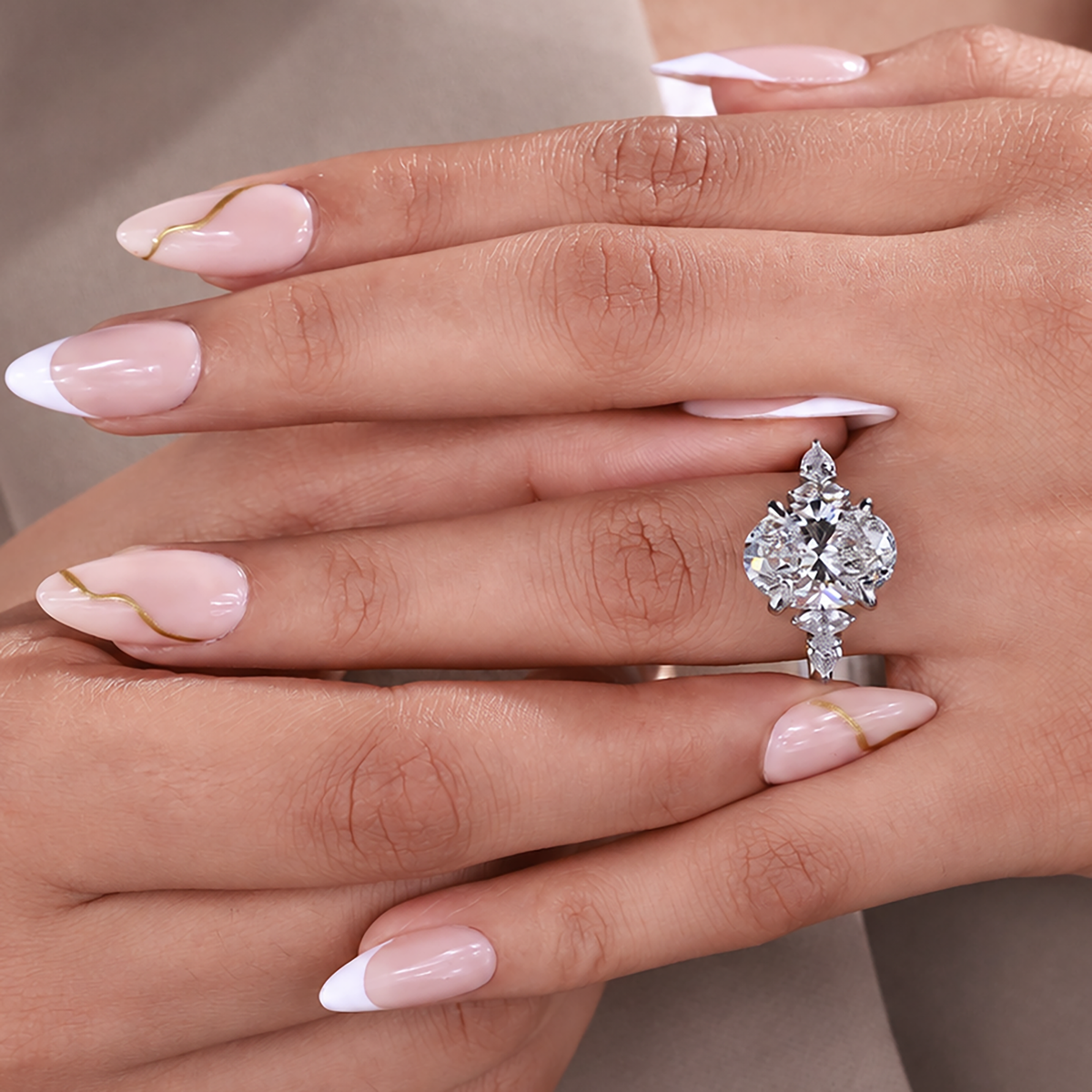 four claw prong with oval cut diamond ring