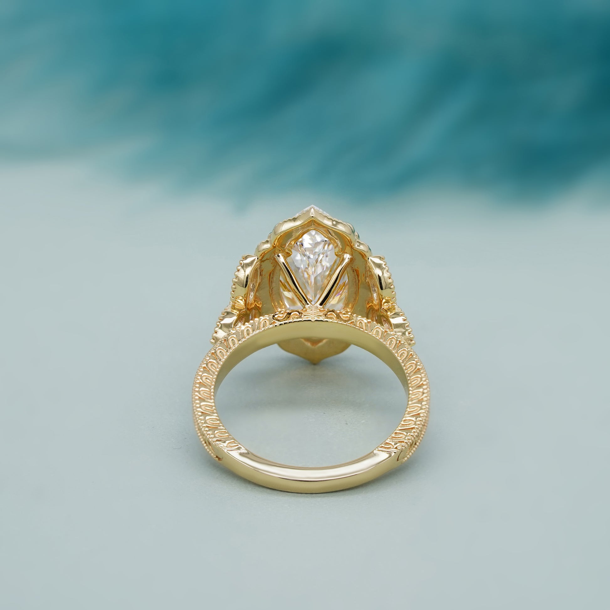 Yellow gold vintage marquise engagement ring close-up
