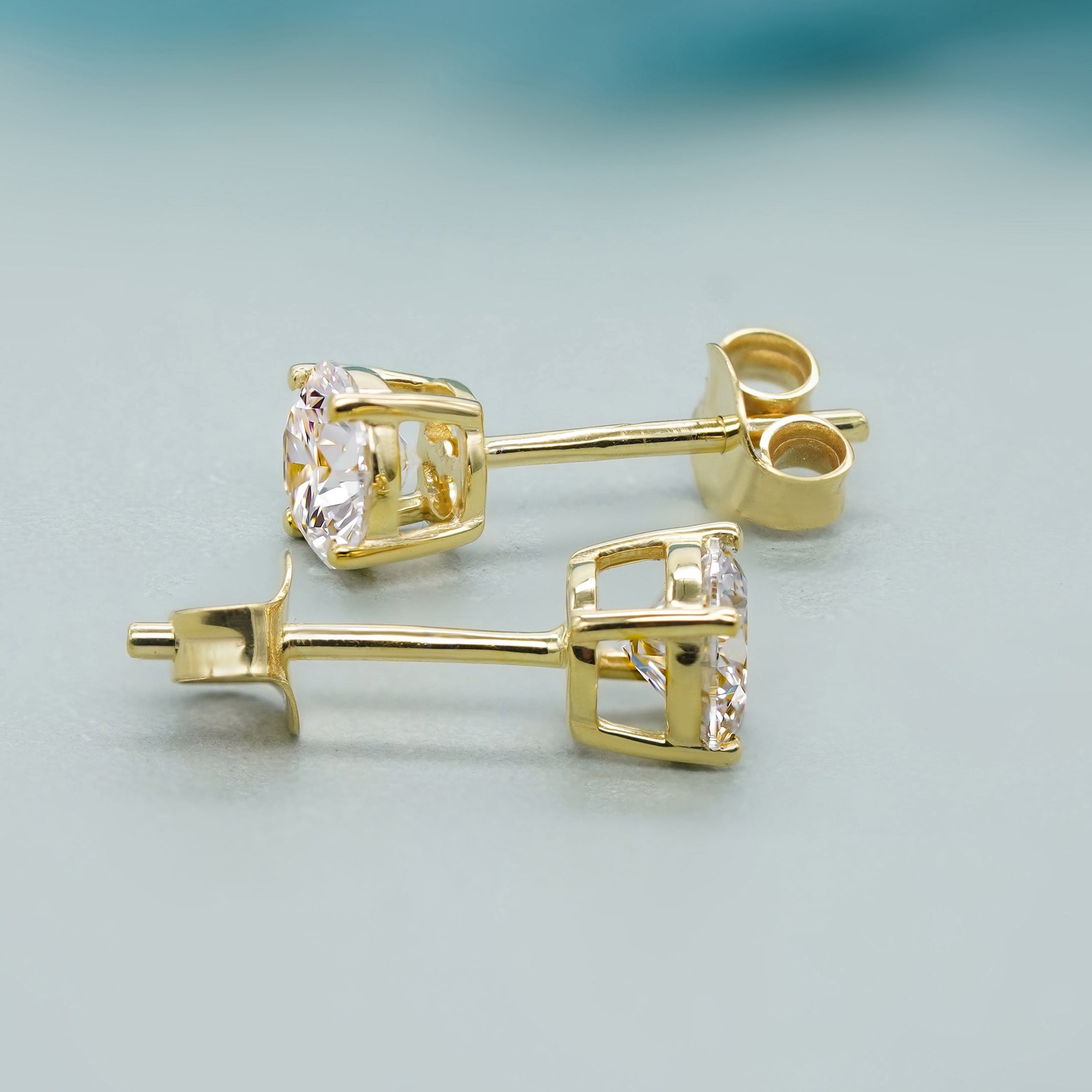 Yellow gold solitaire lab grown diamond earrings