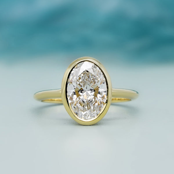 bezel set oval Engagement Ring | yellow gold | Lab Grown Diamond