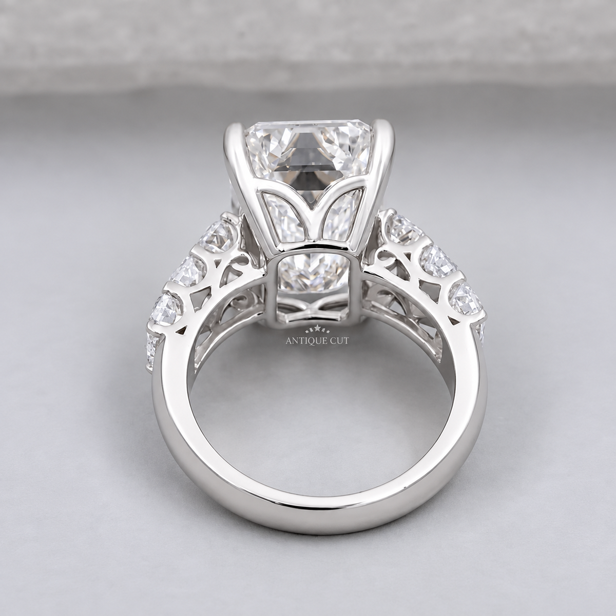 9.0 Carat Lab Grown Emerald Cut Engagement Ring with Tapered Side Stones