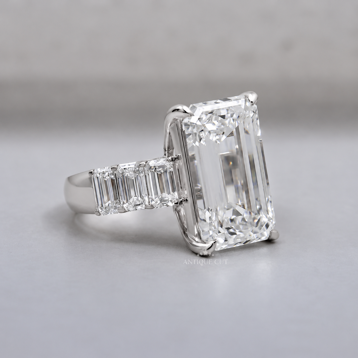 9.0 Carat Lab Grown Emerald Cut Engagement Ring with Tapered Side Stones
