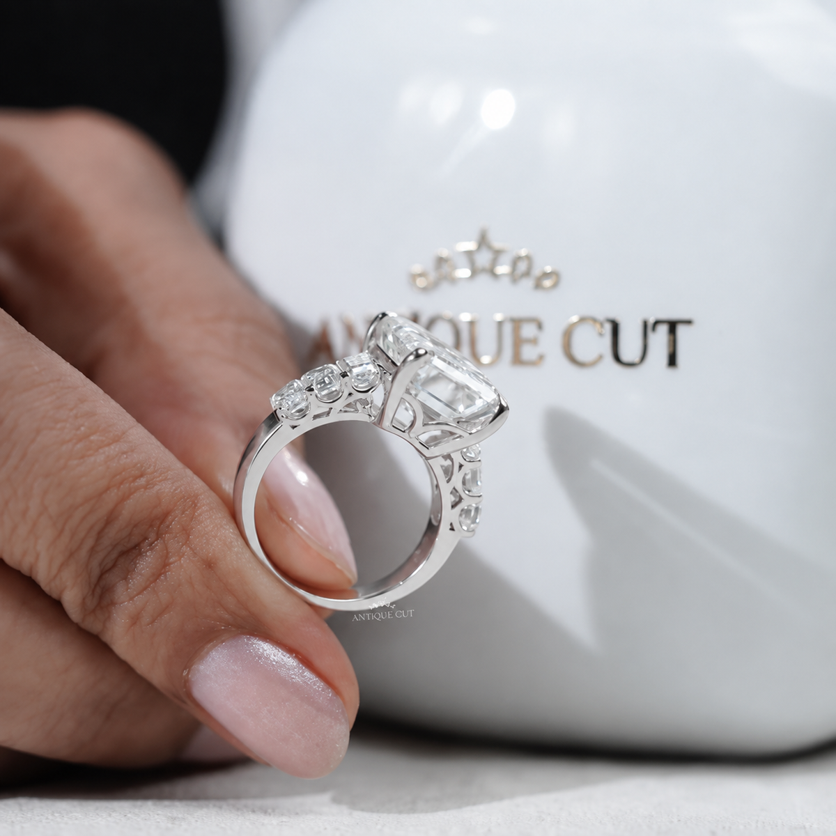 9.0 Carat Lab Grown Emerald Cut Engagement Ring with Tapered Side Stones