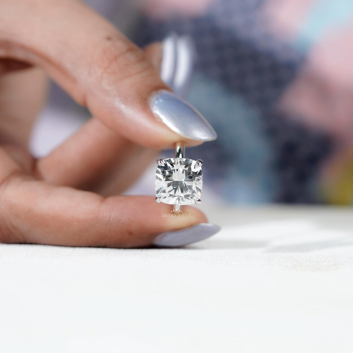 Sophisticated cushion cut diamond ring for proposals