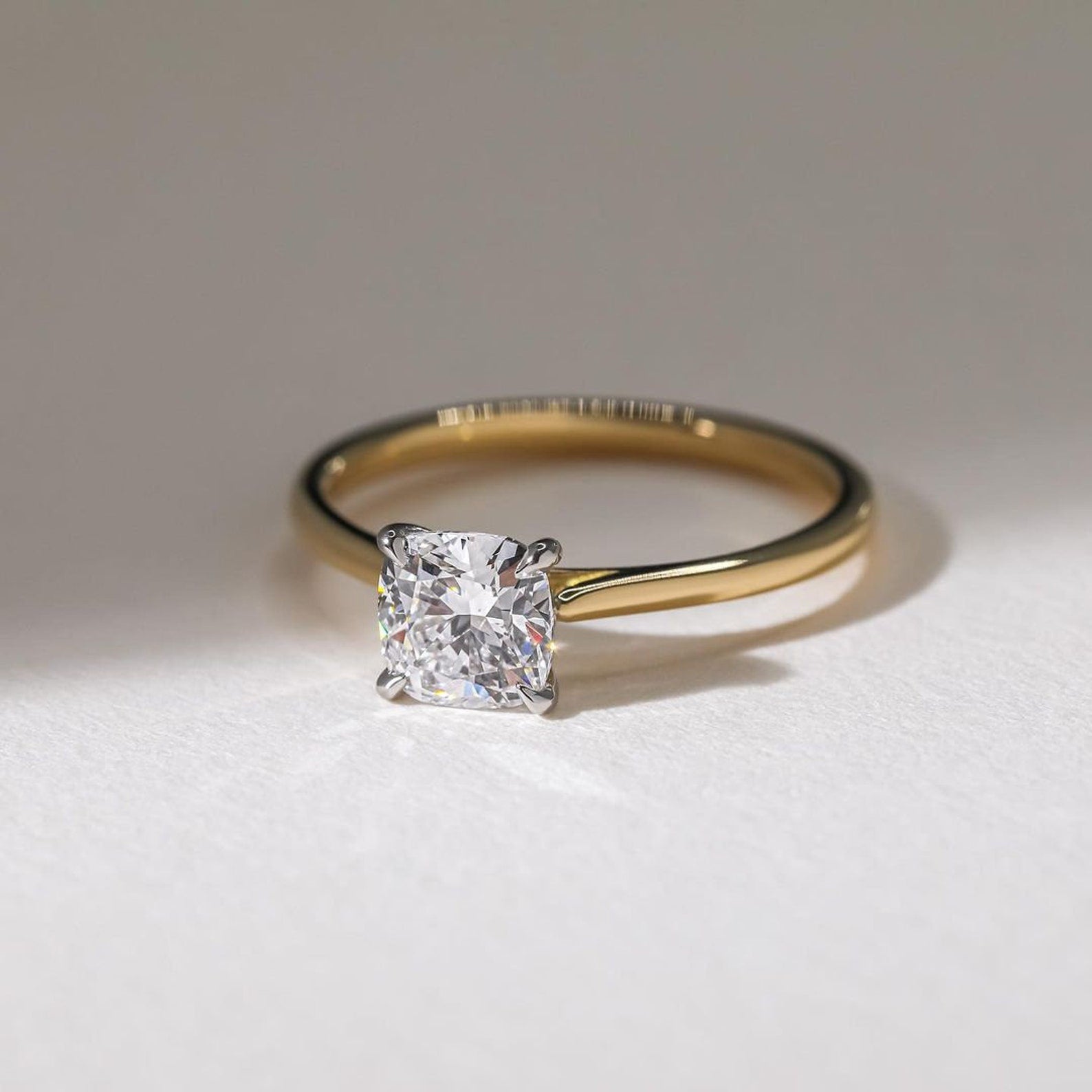 Lab grown cushion diamond with two tone band
