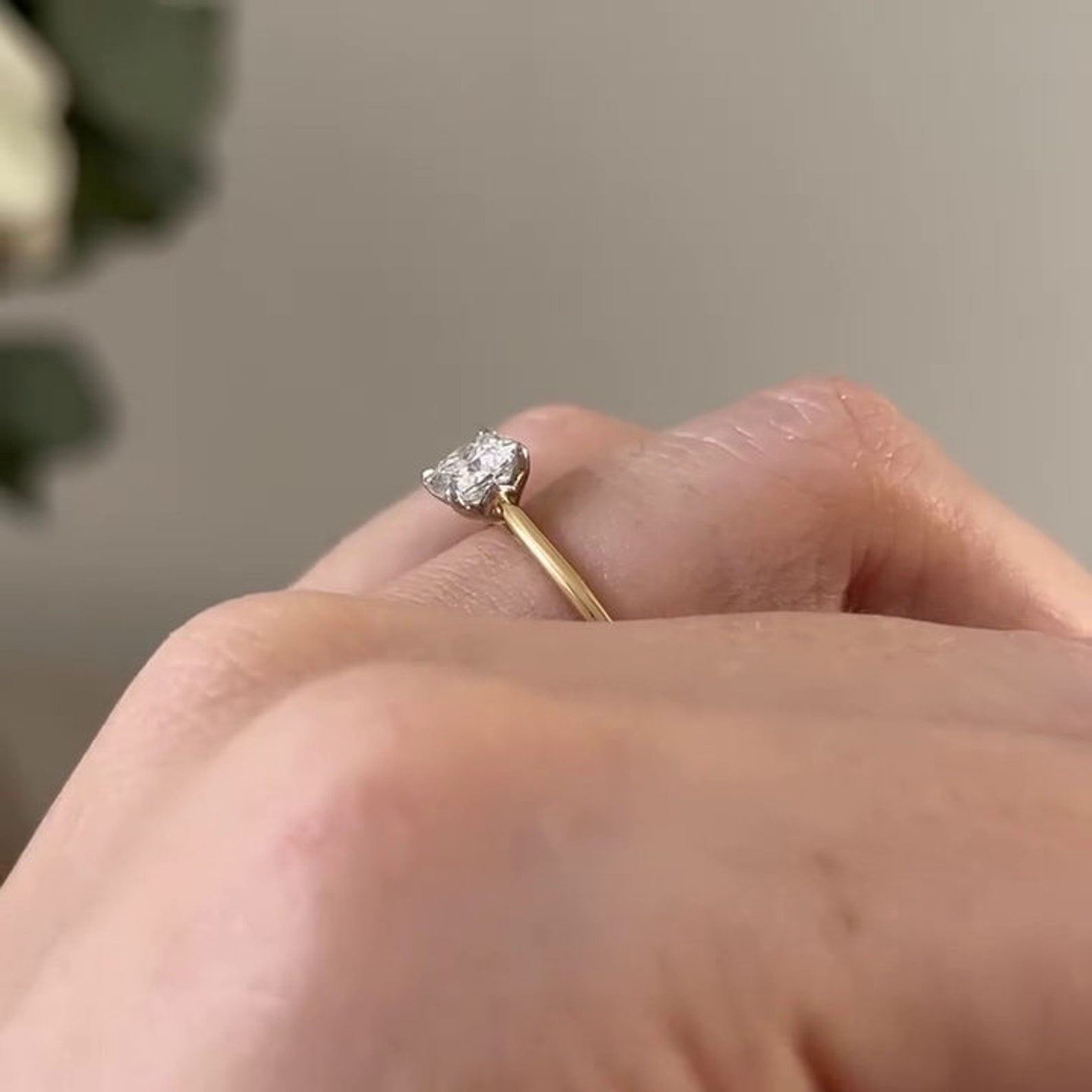 Close up of cushion cut diamond setting