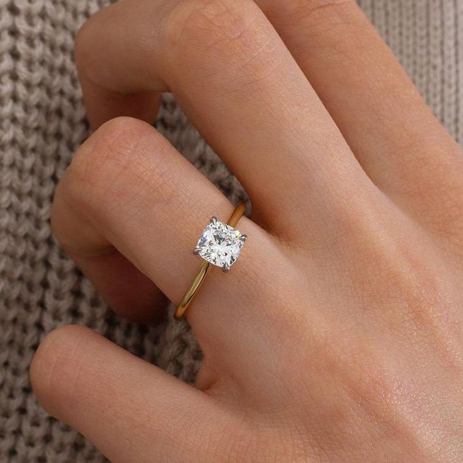 Cushion cut diamond ring with two tone design