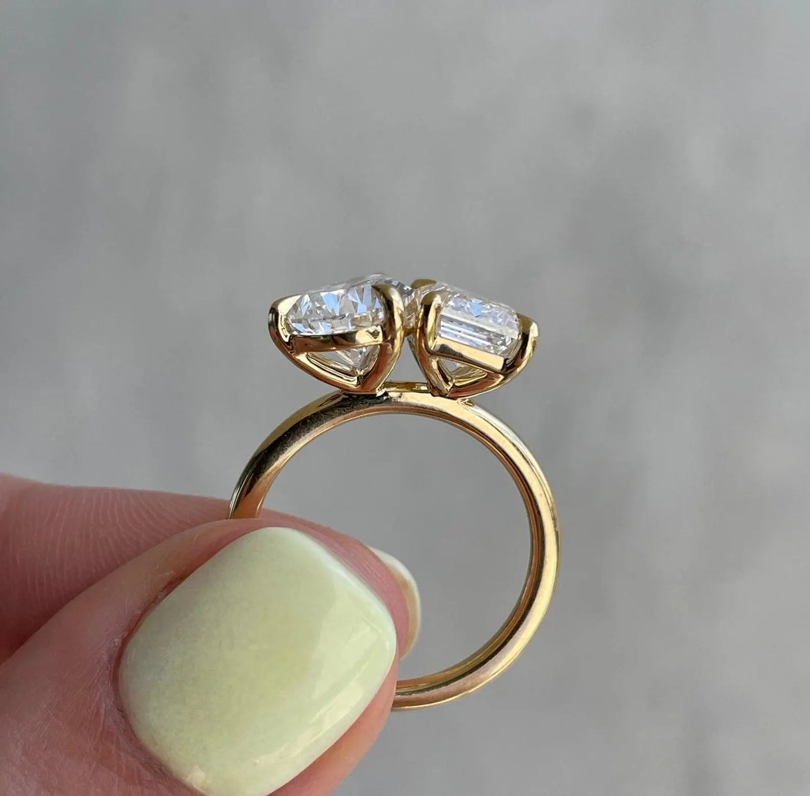 Pear and emerald diamond ring in gold