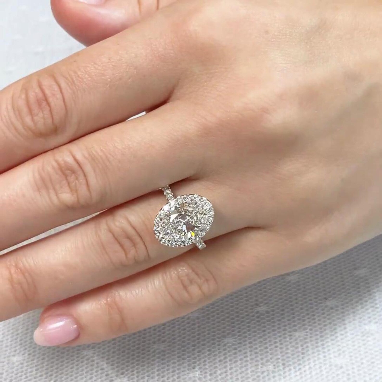 Oval 3.70tcw Lab Grown Diamond Halo And Hidden Halo Cathedral Shank Engagement Ring, DEF Color, VVS-VS Clarity - IGI Certificate