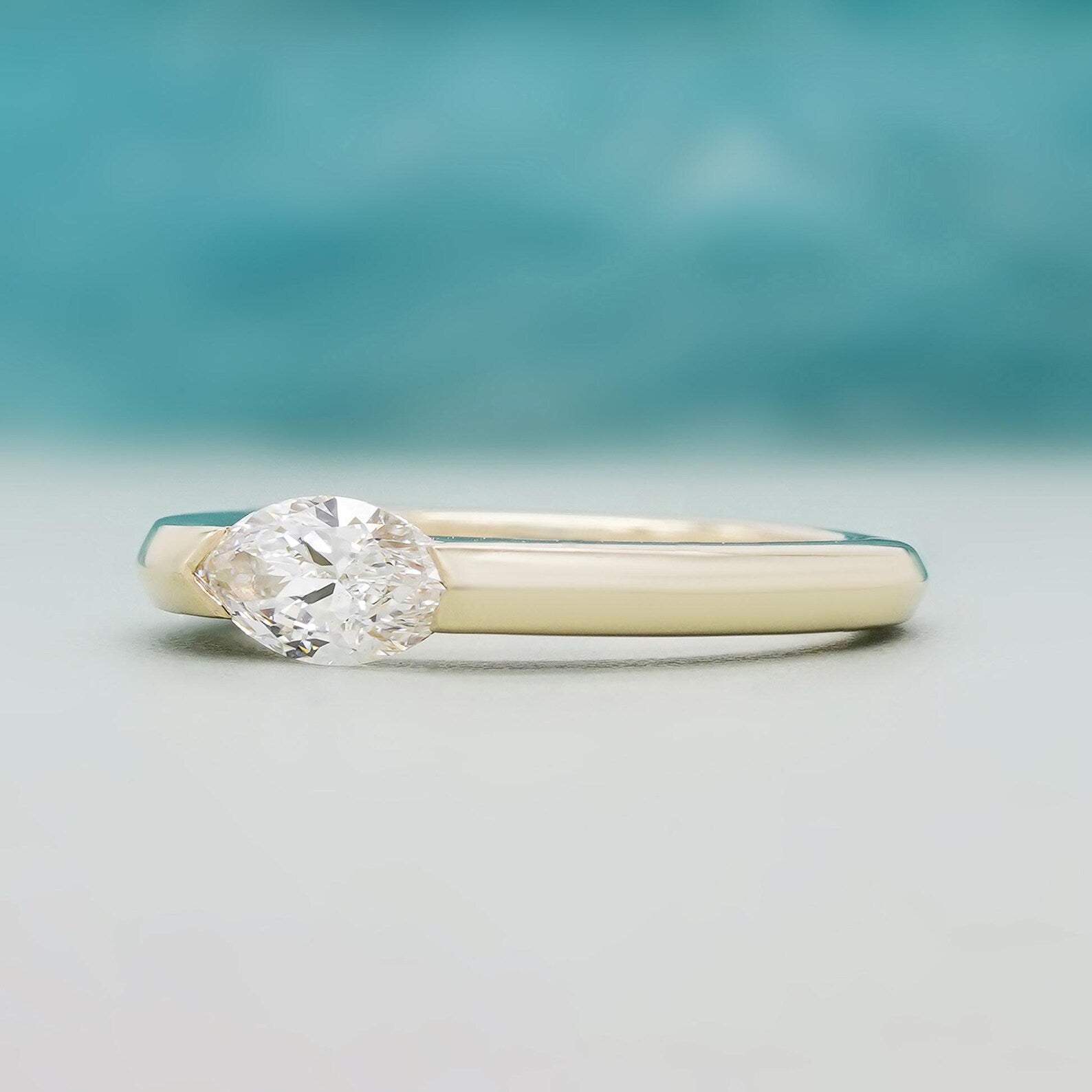 East West Marquise Solitaire Engagement Ring With Half Bezel Ring | IGI Certified