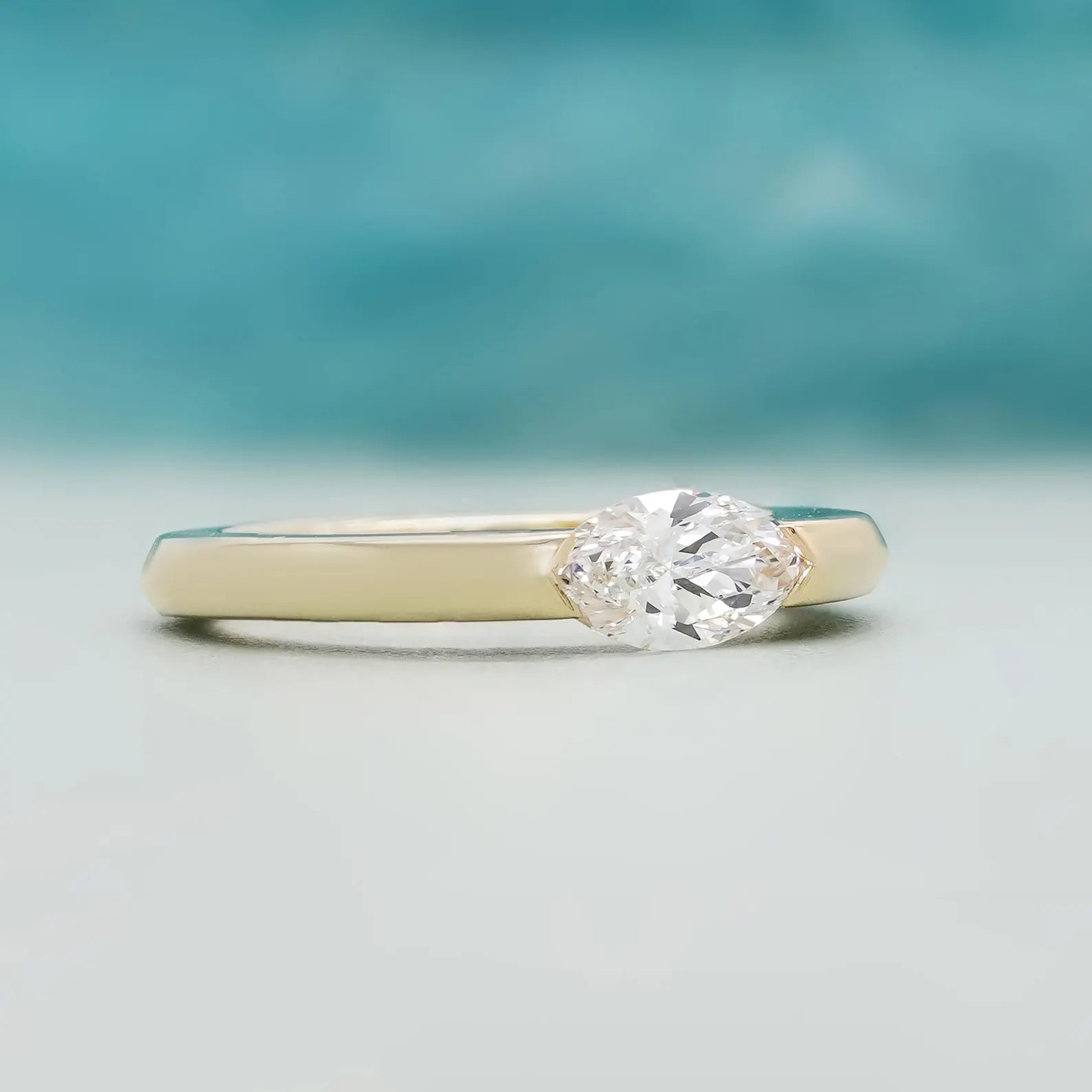 East West Marquise Solitaire Engagement Ring With Half Bezel Ring | IGI Certified