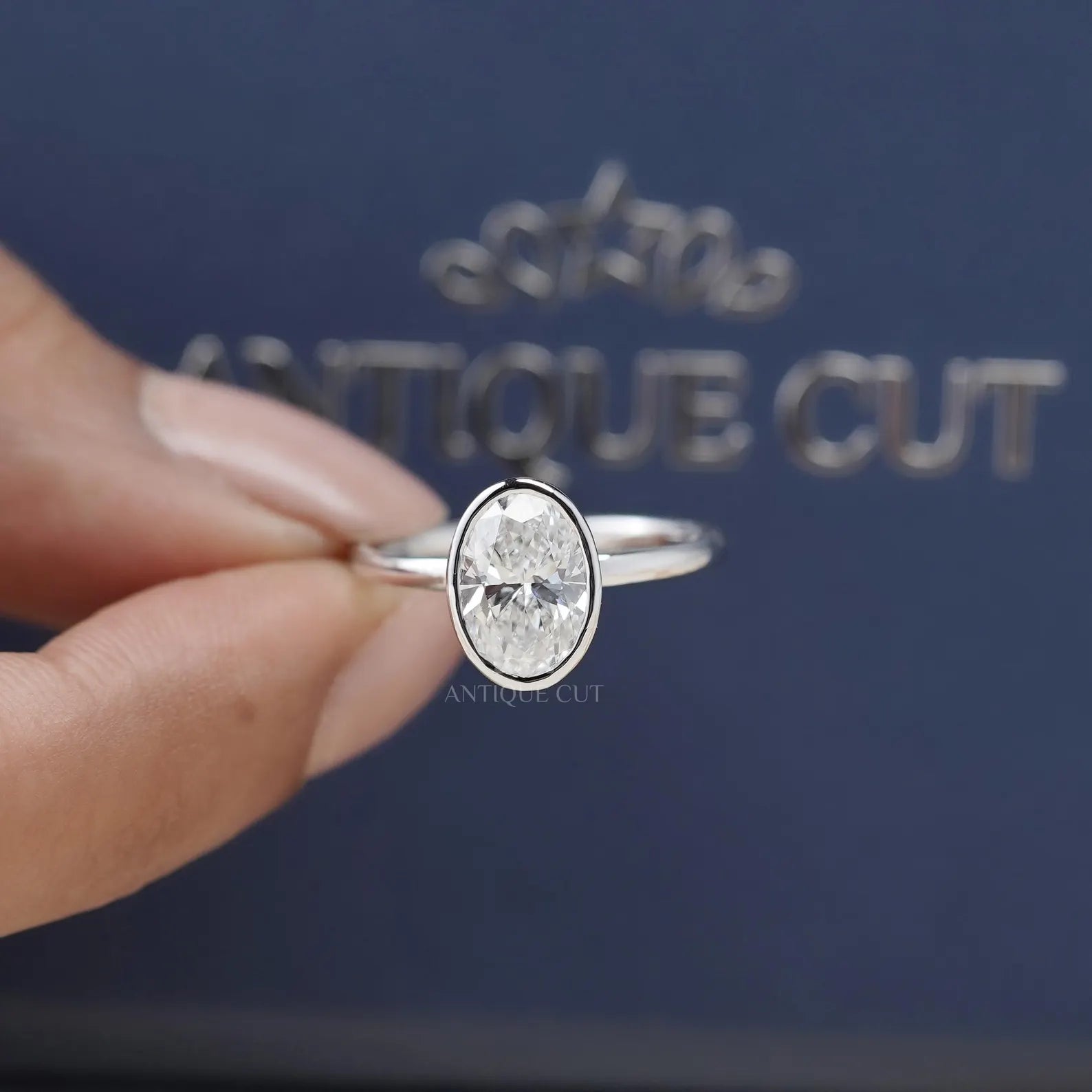 Bezel Oval Diamond Solitaire Engagement Ring with Tulip Set
