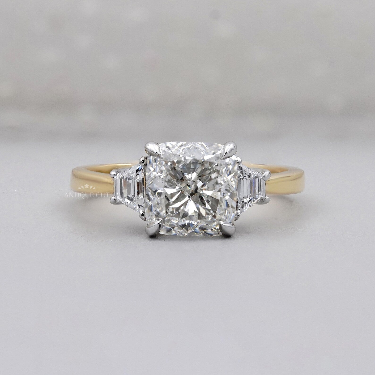 Cushion Cut 3.10tcw Lab-Grown Diamond Three-Stone Ring | Baguette Side Stones | Two-Tone Gold Setting | IGI Certified
