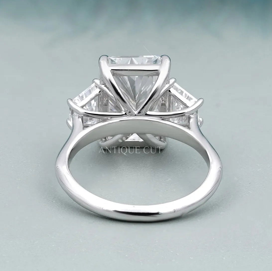 White gold radiant diamond ring with trapezoid side stones