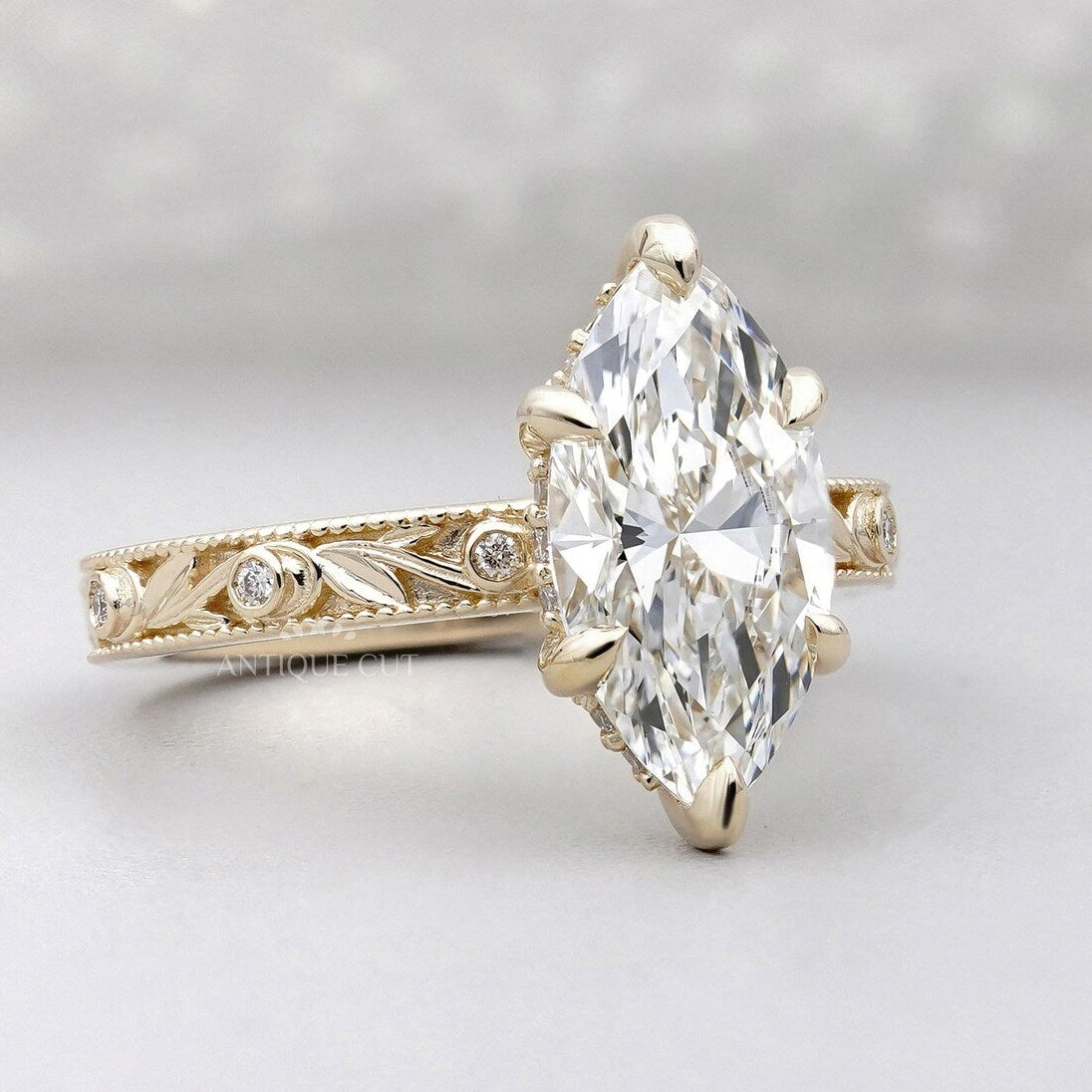 IGI certified marquise engagement ring with engraving