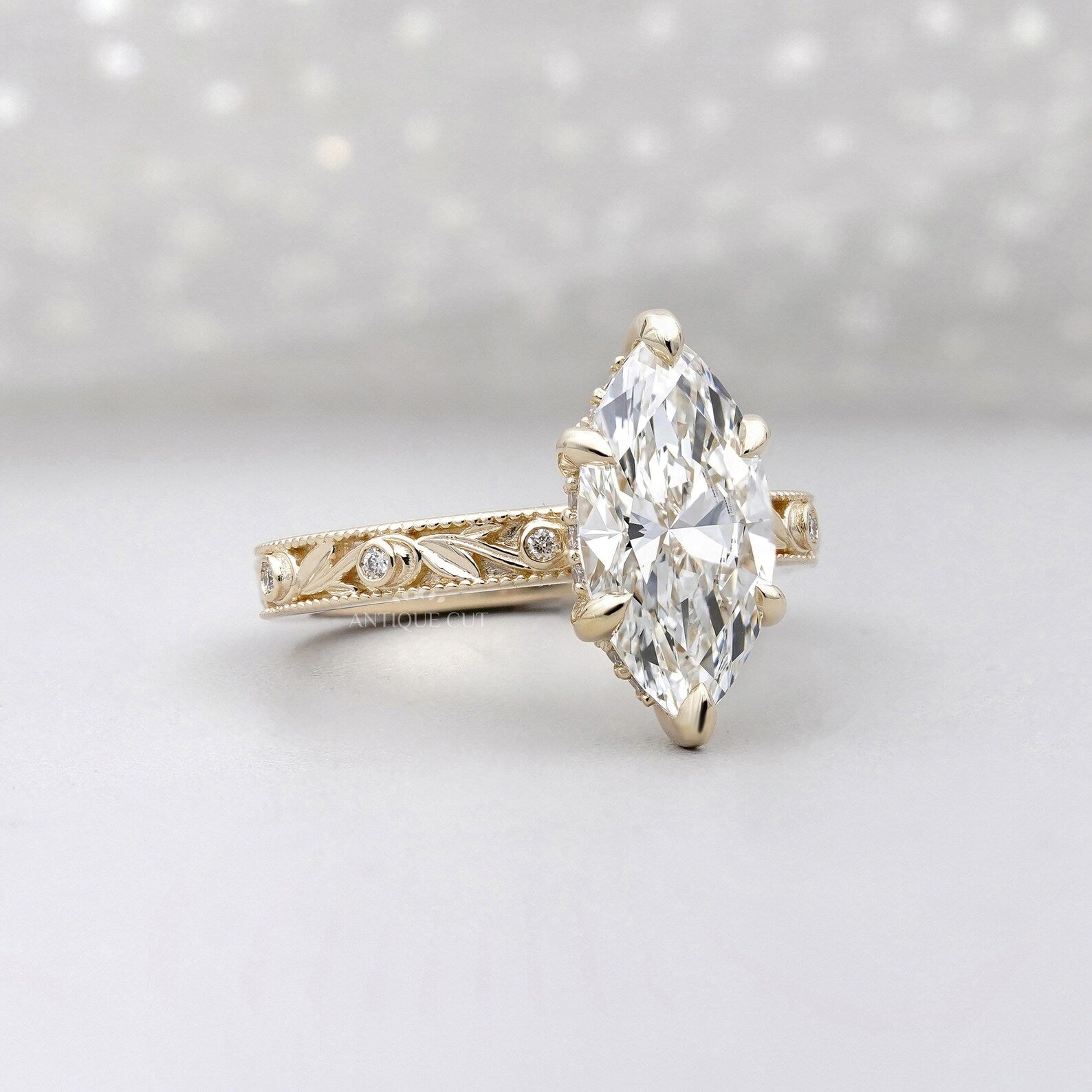 IGI certified marquise engagement ring with engraving