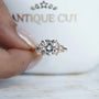 Cushion cut lab grown diamond ring with baguette