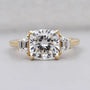 Lab grown three-stone cushion cut ring with baguette side stones