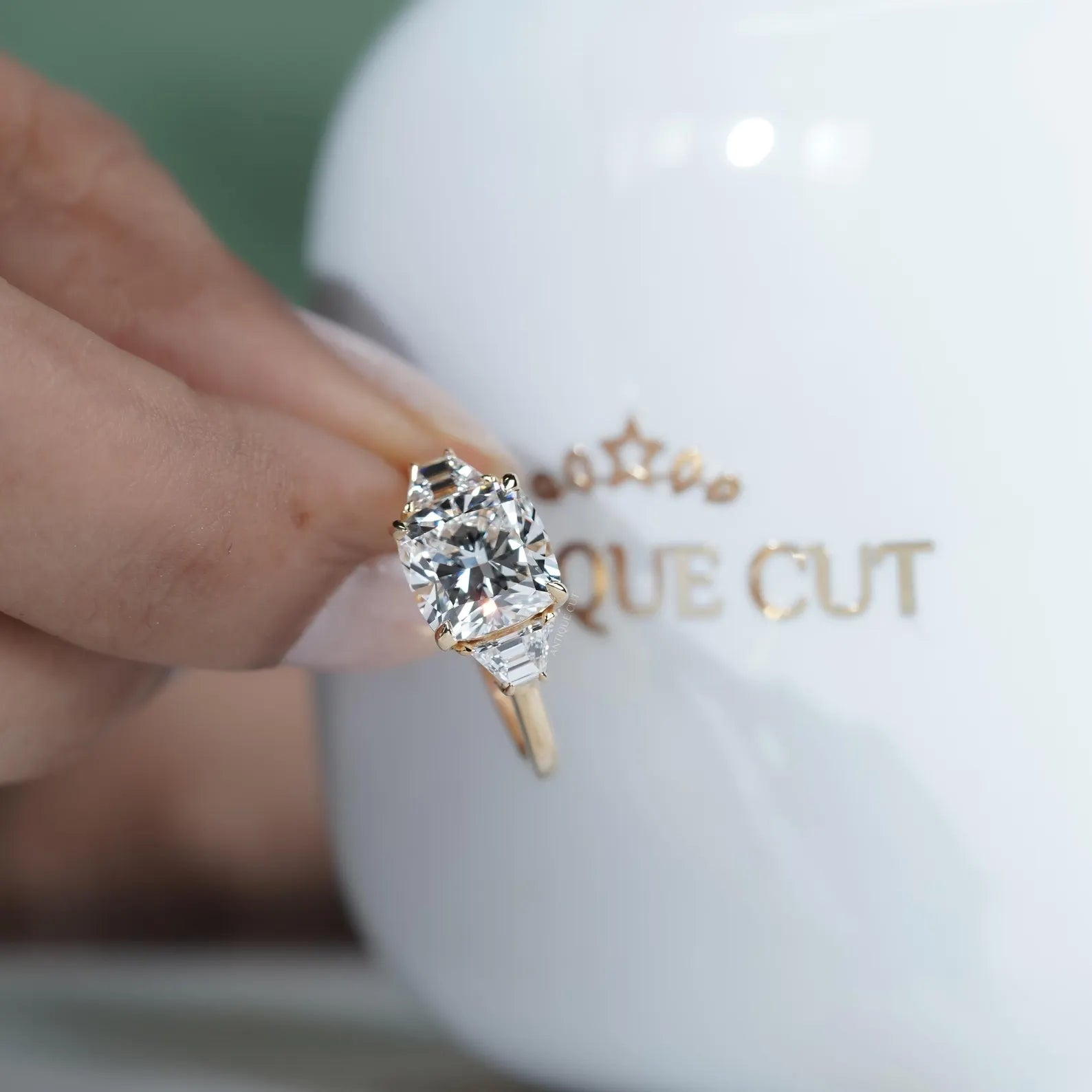 Baguette side stone cushion cut engagement ring